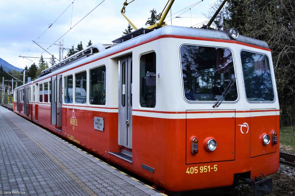 Vintage red electric rack railway train at Štrbské Pleso station at Štrbské Pleso, High Tatra Mountains, Slovakia