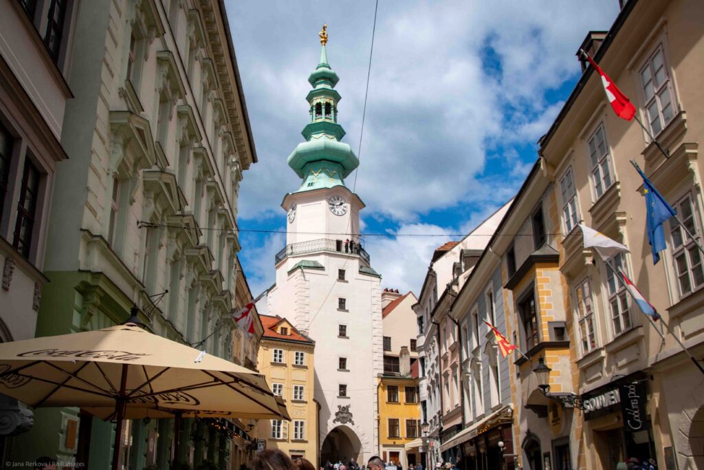 Pedestrian view of Michael's Gate (Michalská brána) from Michalská Street