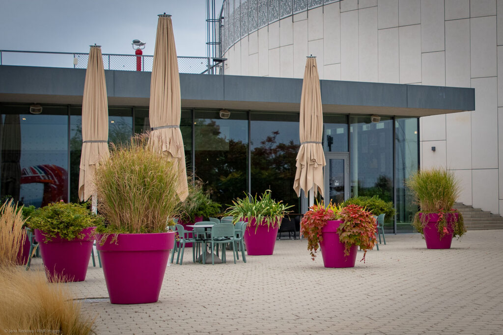 A paved outdoor terrace of the Art Café at Danubiana Meulensteen Art Museum in Bratislava.